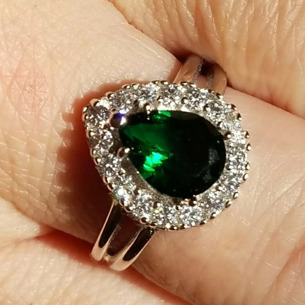 Simulated May's Emerald 10x7mm halo and cz ring
